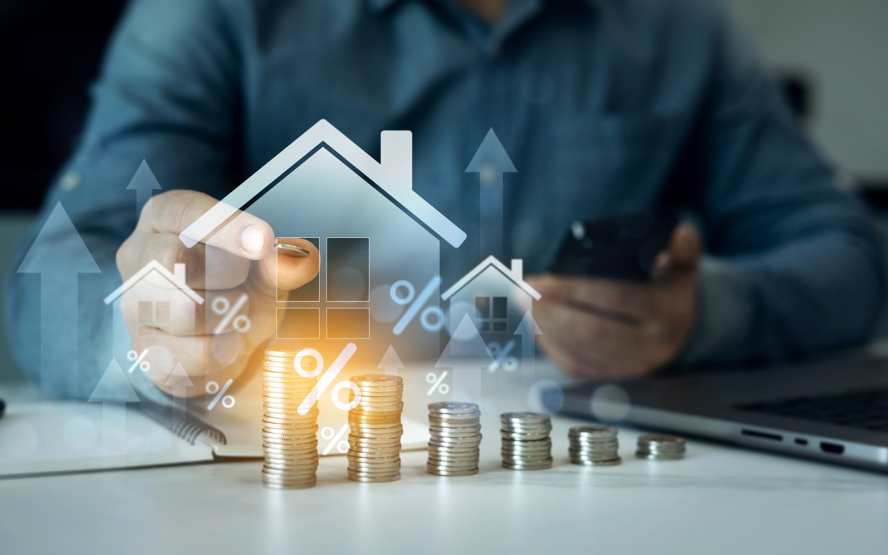 Person analyzing real estate market trends