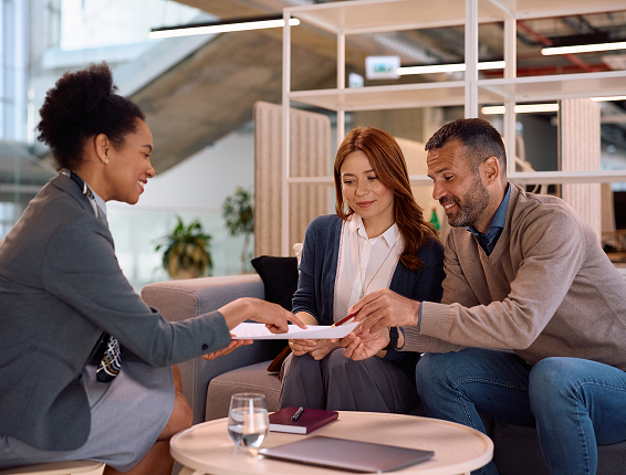 Professionals reviewing paperwork together