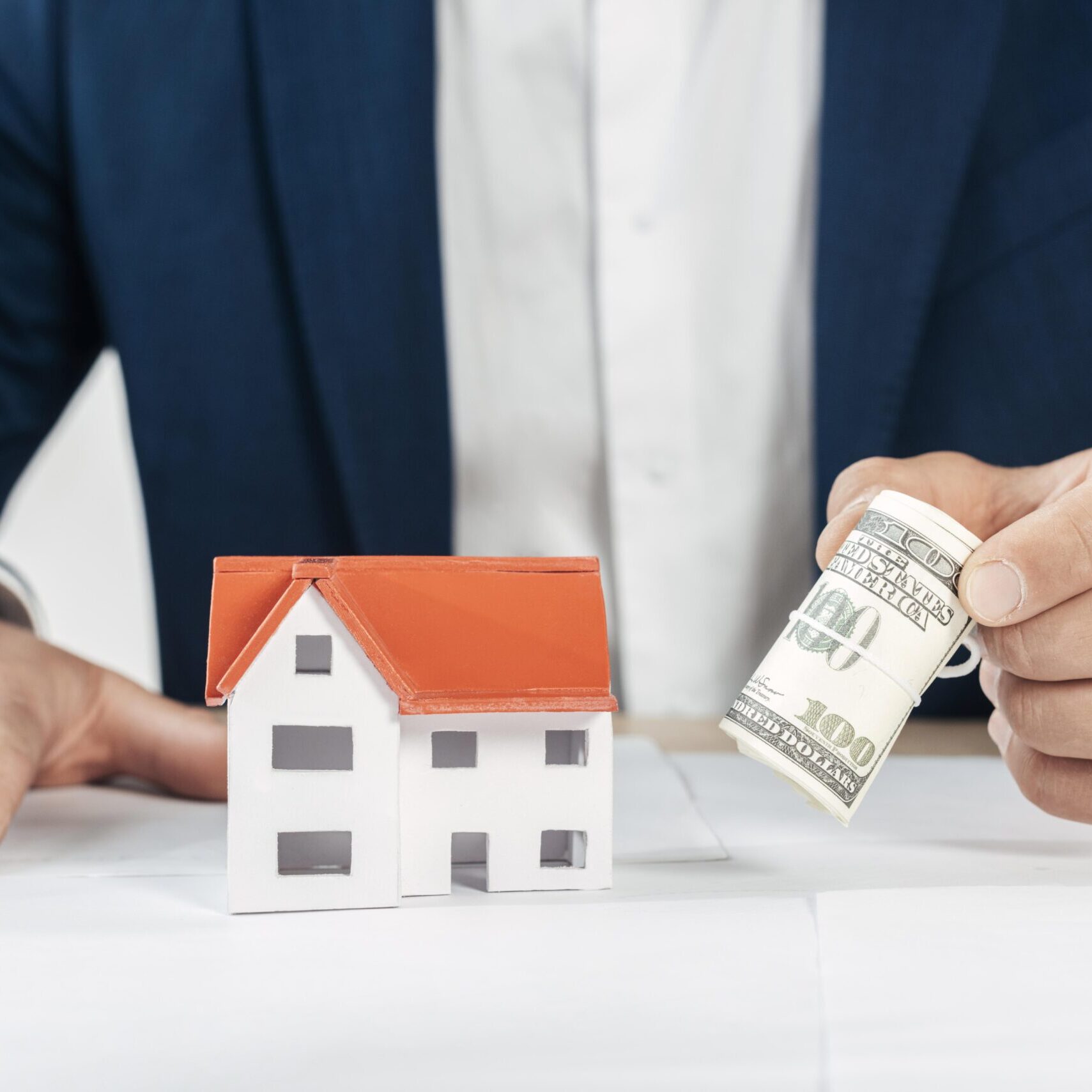 close-up-hand-holding-cash